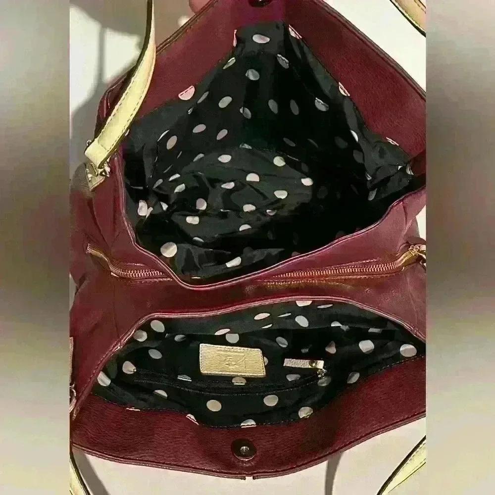 An Anne Klein 3 compartment lrg. Hobo bag.